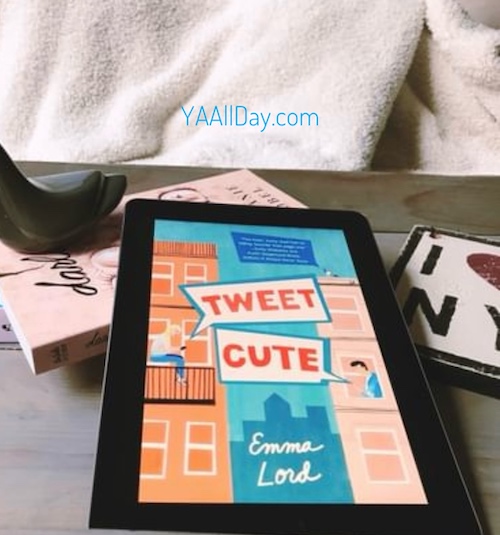 Original Photo of Tweet Cute by Emma Lord on a table next to an I Love New York sign
