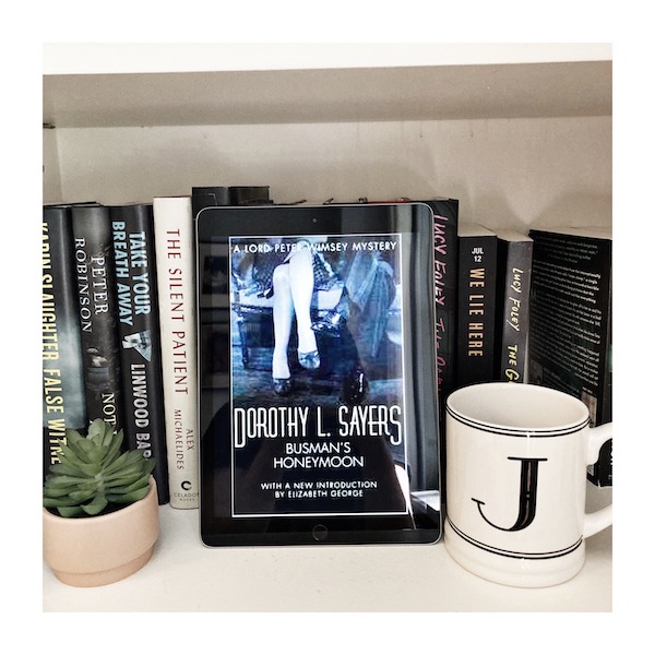 Thrillers with Weddings: cover of Busman's Honeymoon with books, a mug and a plant