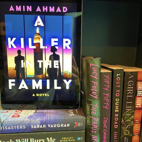Photo of A Killer in the Family next to other colorful thrillers