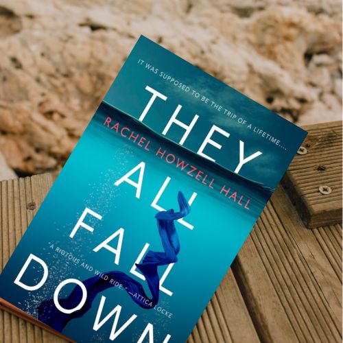 They All Fall Down on a pier over the sandy beach