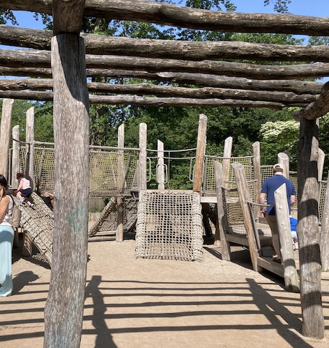 Photo of the rustic bridge at the Billy Johnson Playground in Central Park. Photo by Jen Ryland LLC.