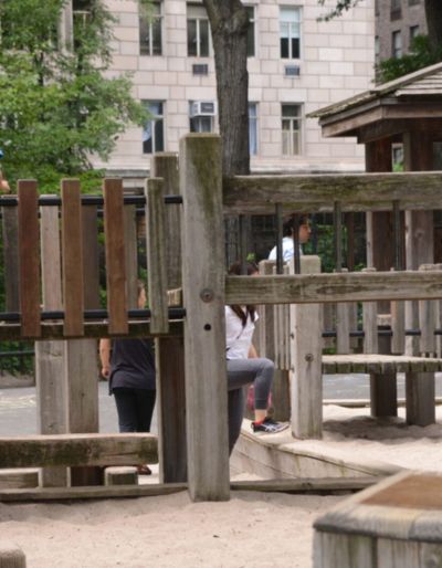 Photo of the wooden play structure at the Diana Ross Playground in Central Park.