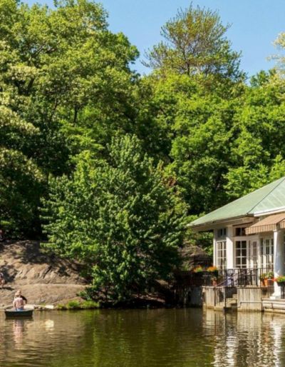 Photo of the Loeb Boathouse next to the Lake in Central Park. Photo by Jen Ryland LLC.