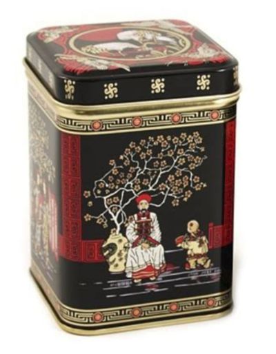 A black red and gold Japanese tea tin with a flowering tree and figures