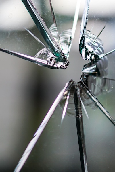 Close up photo of a broken window
