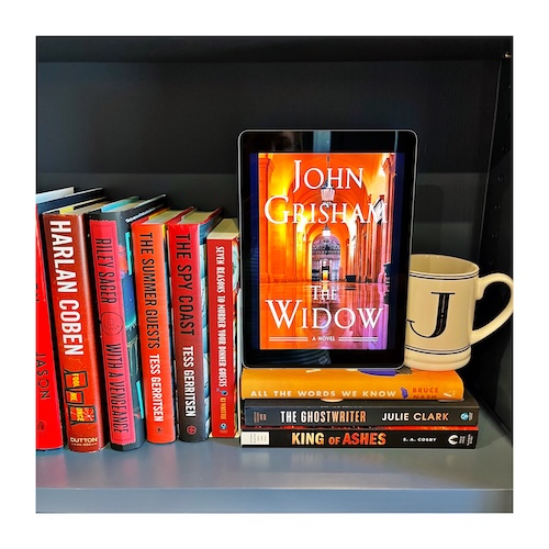 Original photo of The Widow by John Grisham. The book shows a photo of a courthouse hallway