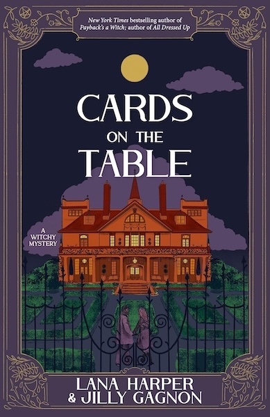 Cover of Cards on the table a new paranormal mystery. Cover shows an illustration of a mansion at night
