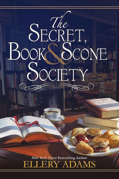 Cover of Secret Book and Scone Society which shows a book and tasty treats on a table