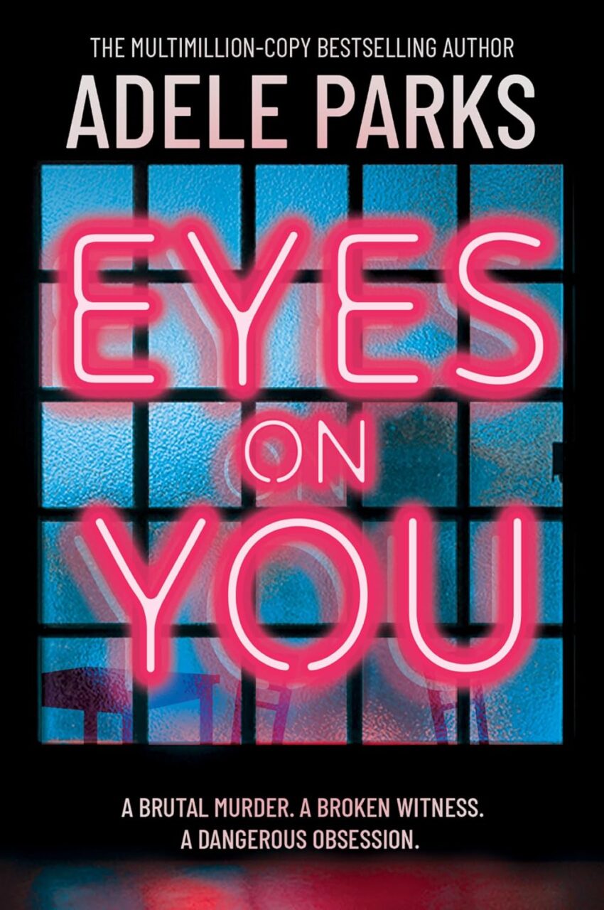 The Cover of Eyes on You. The title in neon against a window