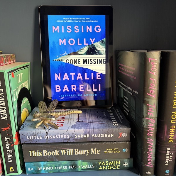 Original image of the cover of Missing Molly on a stack of books